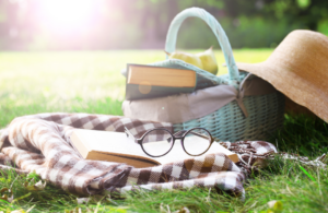 Books with basket and hat